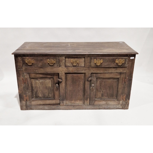 1124 - 18th / early 19th century oak dresser base, the top with thumb-nail moulded edge, three drawers with... 