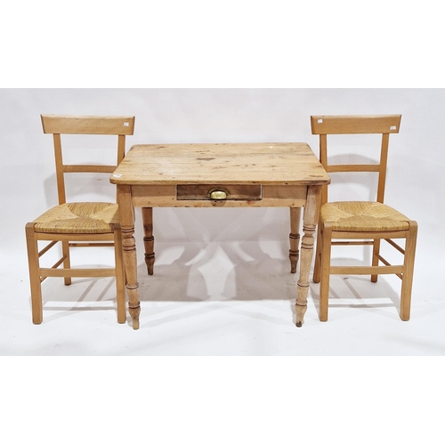 1134 - 19th century small pine kitchen table, of rectangular form with drawer to side, raised on turned bal... 