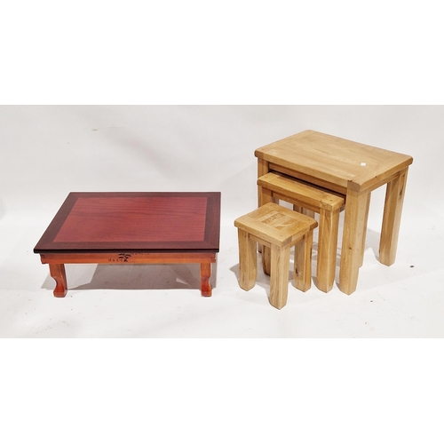 1164 - Modern oak nest of three tables, raised on square legs, largest 52cm wide x 49cm high, a modern oak ... 