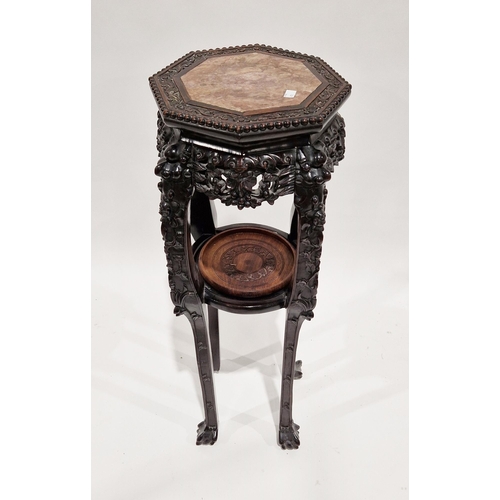 1229 - 19th century Chinese ebonised hardwood jardiniere stand, the octagonal top with marble panel inlay s... 