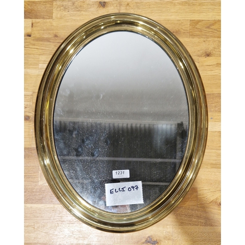 1231 - Early 20th century gilt brass framed oval mirror, 47cm x 37cm