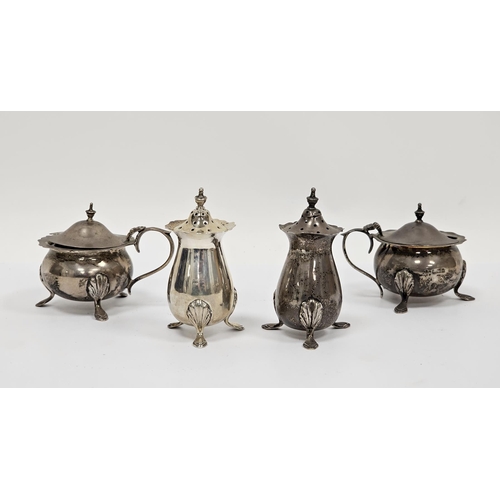 289A - Matched four piece silver condiment set, Birmingham dates between 1907 and 1911, comprising two pepp... 