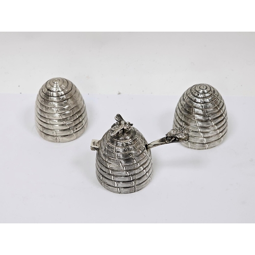 299 - Novelty silver condiment set in the form of beehives, London 1990, Garrard & Co Ltd, comprising salt... 