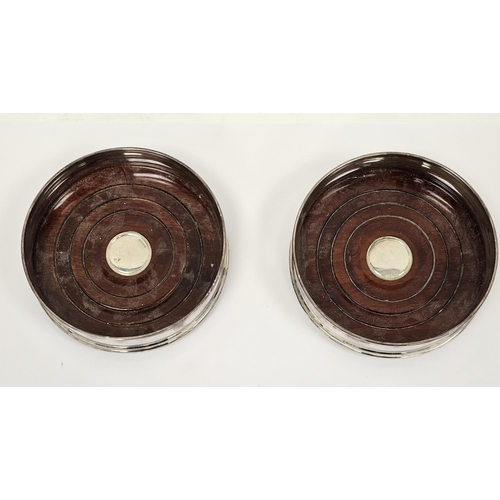 300A - Pair of silver and mahogany wine bottle coasters, Sheffield 1997, Carr's of Sheffield Ltd, 12.5cm di... 