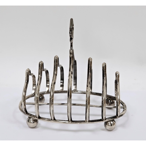 301 - Edward VII silver toastrack, Birmingham 1906, J Sherwood & Sons, six shaped sections and raised on b... 