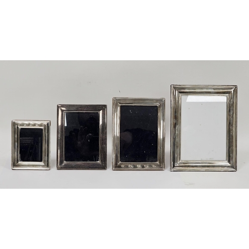 302 - Four silver and wooden easel back photograph frames, Sheffield 2000, 2001 and 2002, Carr's of Sheffi... 