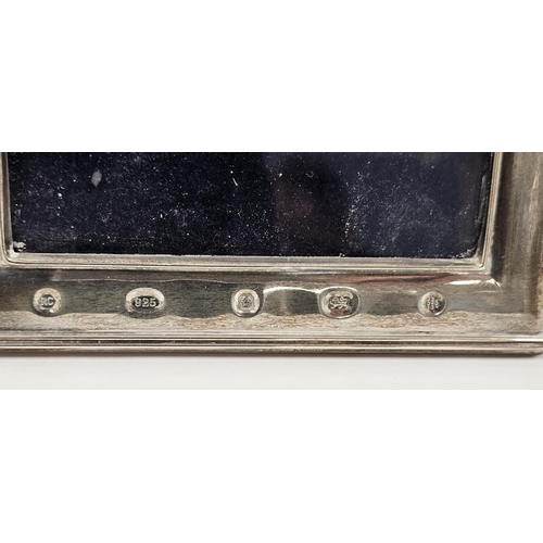 302 - Four silver and wooden easel back photograph frames, Sheffield 2000, 2001 and 2002, Carr's of Sheffi... 