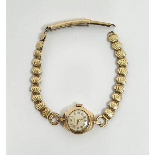 347 - Lady's Rotary 9ct gold plated wristwatch with champagne face, mid 20th century, on plated strap