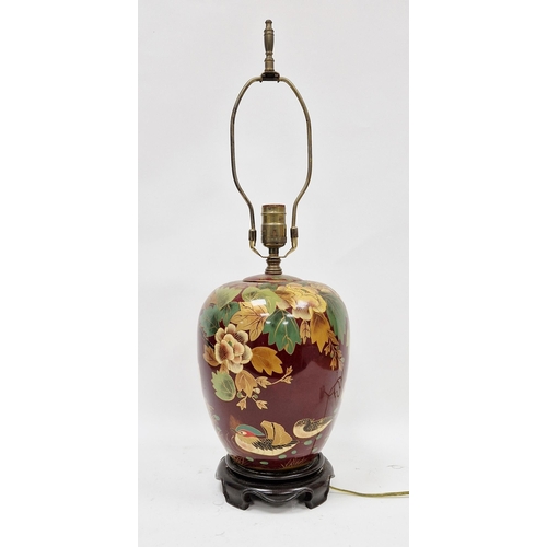 36 - Chinoiserie style pottery lamp vase, enriched in a dark red glaze and decorated in the lacquer style... 