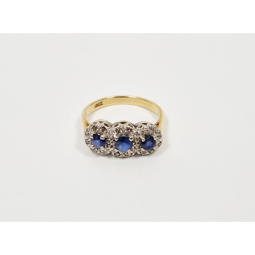 476 - Gold-coloured metal, blue and white stone triple oval cluster ring set three oval blue stones, proba... 