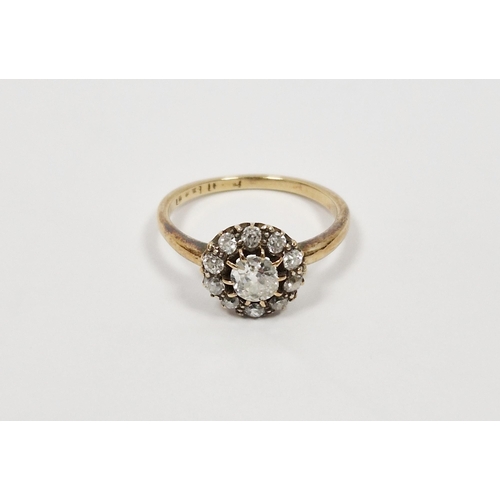 486 - Gold and diamond cluster ring, the centre stone approx. 0.4ct surrounded by multiple old cut smaller... 