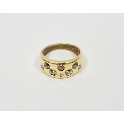 493 - 18K gold and diamond ring, the tapering band set with eight old cut variously sized diamonds in rubo... 