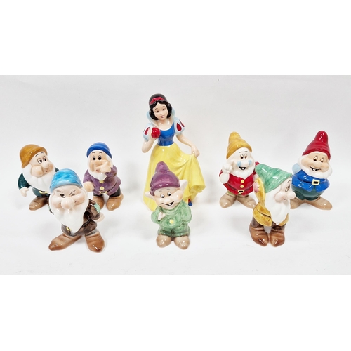 51 - Snow White and the Seven Dwarfs figures marked Disney China, largest 29cm high