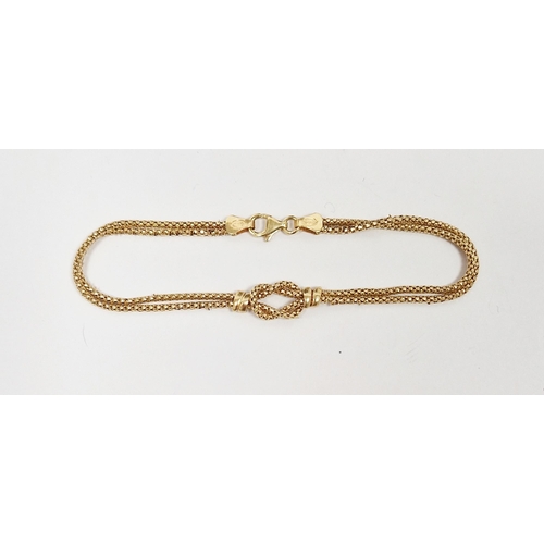 522 - 9ct gold reef knot pattern bracelet, 3.5g