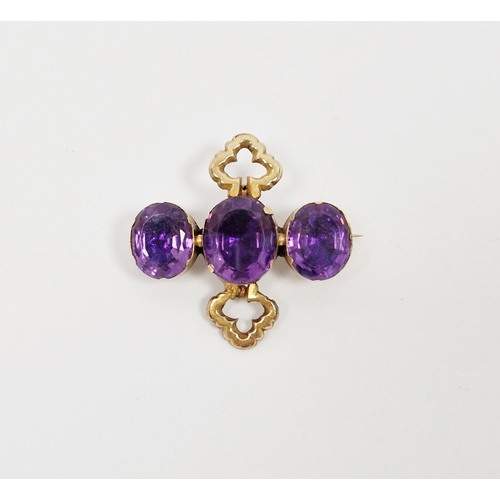 543 - 19th century amethyst brooch, composed of three oval mixed cut amethysts in a yellow metal claw set ... 