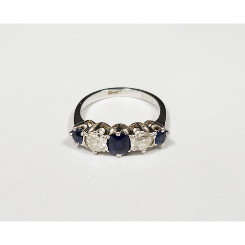 562 - Sapphire and diamond five stone platinum ring, three oval mixed cut sapphires, the central sapphire ... 