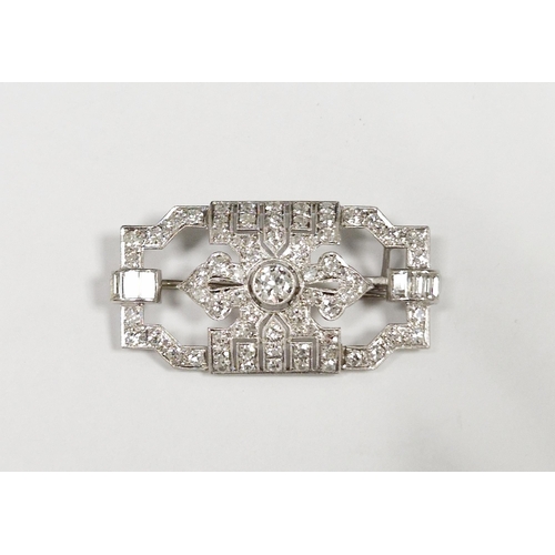 563 - Art Deco diamond white metal openwork brooch, the principal round brilliant cut diamond to centre me... 