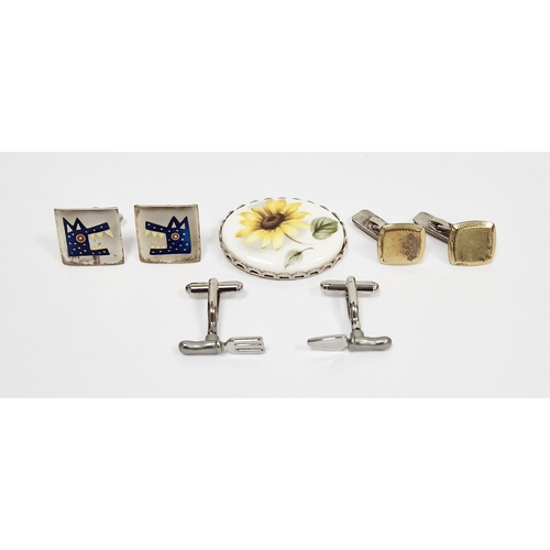 570 - Pair of silver hallmarked square cufflinks with decoration of stylised wolves together with another ... 