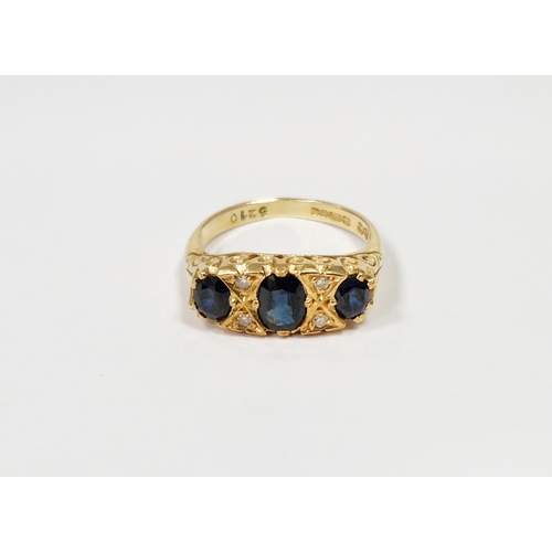 580 - 18ct gold, sapphire and diamond dress ring set three oval sapphires interspersed with four small dia... 