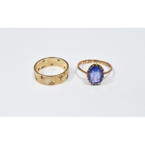 585 - Gold-coloured metal and blue stone dress ring set oval claw set blue stone and a 9ct gold and white ... 