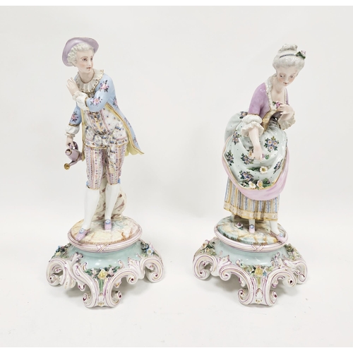 6 - Pair of late 19th century French porcelain figures of a gallant gardener and companion, each wearing... 