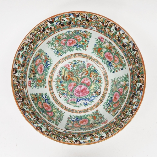 87 - Late 19th/early 20th century Chinese famille rose porcelain bowl raised on a carved wooden stand, th... 