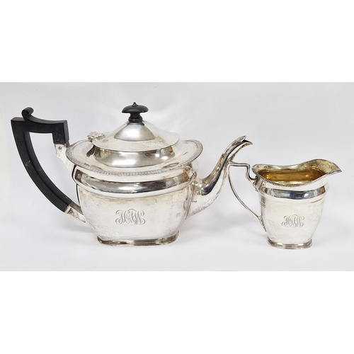 296A - Edwardian silver teapot with matching silver cream jug, each with engraved monogram to front, hallma... 