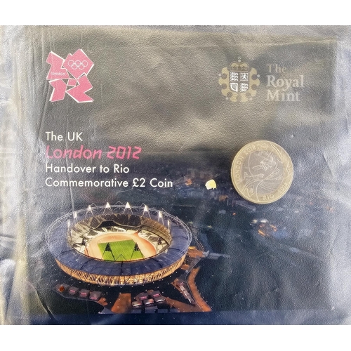 170 - Coin album consisting of 29, 2012 Olympic 50p's with 4 x £5 coins and Handover to Rio £2