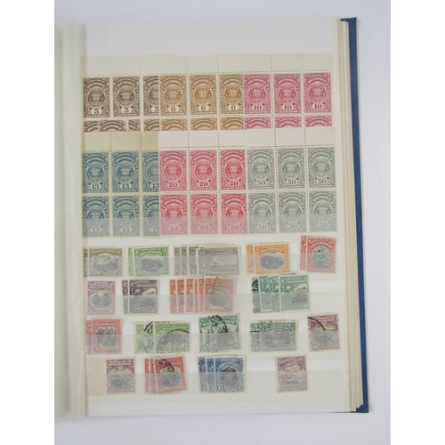 373 - Portugal Colonial Stamps: Large 48 page stock book of mint and used issues including Angola, Azores,... 