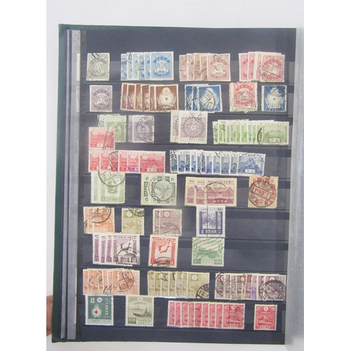 389 - Stamps of Japan: Box of 2 large + 2 slimmer A4 stock books of mint and used issues, from 1870s inclu... 