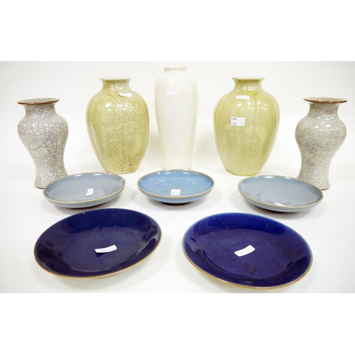 106 - Two pairs of Chinese crackle glazed vases, five blue-glazed saucers and a tapering oviform cream gla... 