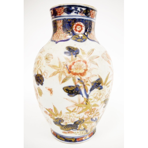 109 - Group of Japanese Imari porcelain, including: an oviform Arita vase painted with flowering chrysanth... 