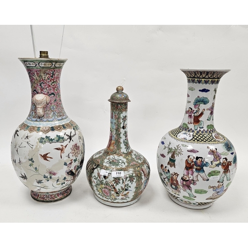 110 - Chinese Canton famille rose bottle vase and cover, 19th century, painted with figures in an interior... 