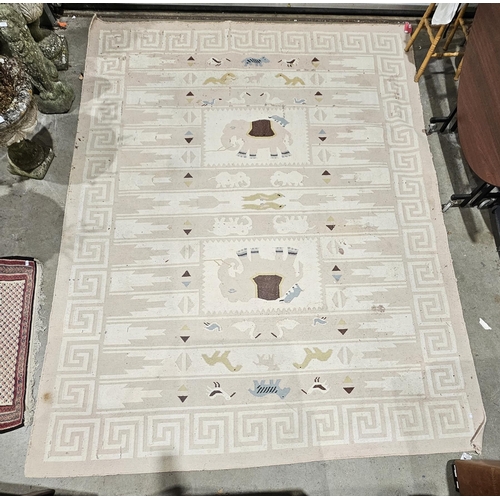 1390 - Large modern cream ground rug with two geometric medallions featuring elephants on geometric and sty... 