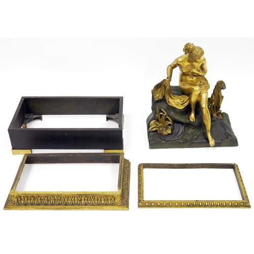 149 - 19th century-style gilt bronze classical semi-naked female seated on a rocky outcrop surrounded by b... 