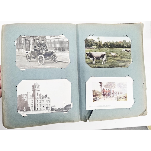 154 - Early 20th century postcard album containing approx. 150 black and white and coloured postcards, inc... 