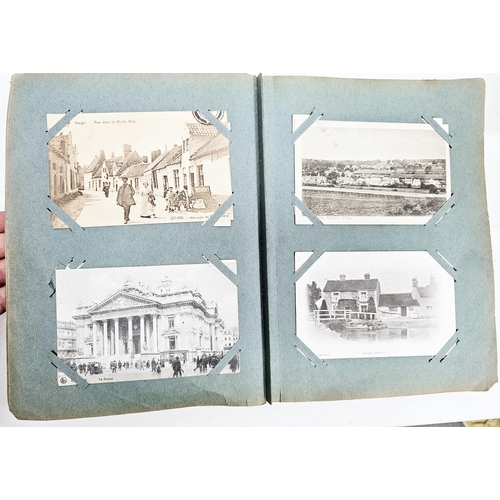 154 - Early 20th century postcard album containing approx. 150 black and white and coloured postcards, inc... 