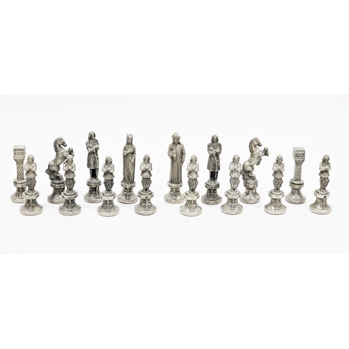 232 - Mid-century chess set in the manner of Brevettato, the silver and brass tone pieces in the form of I... 