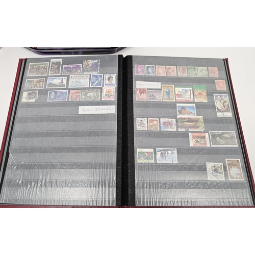 248 - Collection of stamps, first day covers and stamps on paper including two stamp albums partially fill... 