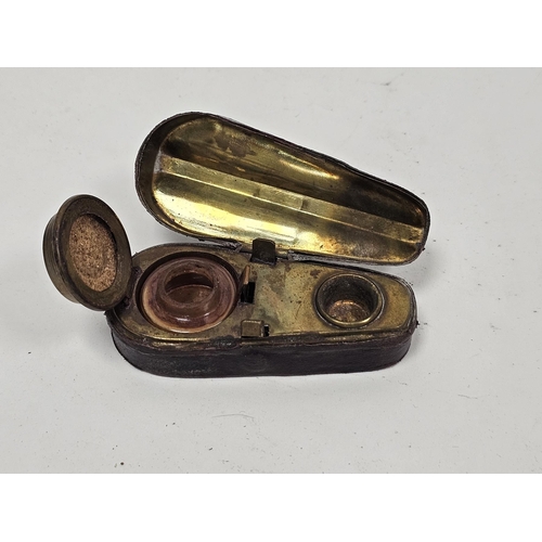 252 - Victorian novelty travelling inkwell in the form of a burgundy leather covered violin case, 9cm long