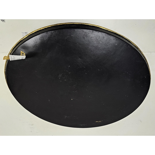 256 - Victorian black painted tole oval two-handled tray, painted with a landscape cartouche, within gilt ... 