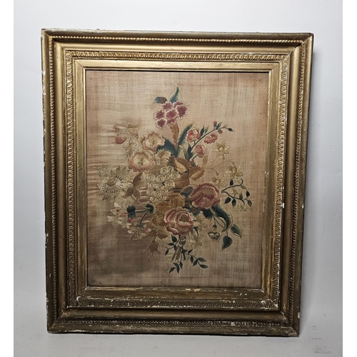 261 - 19th century embroidery on silk of a spray of flowers, gilt-wood framed and glazed, overall measurem... 