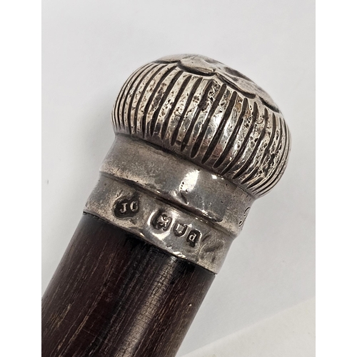 297 - Victorian rosewood walking stick with silver fluted pommel, London 1899, James Oliver, 90.5cm long