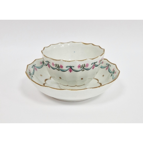 48 - Lowestoft porcelain fluted teabowl and saucer, circa 1790, painted with turquoise and pink swags bel... 