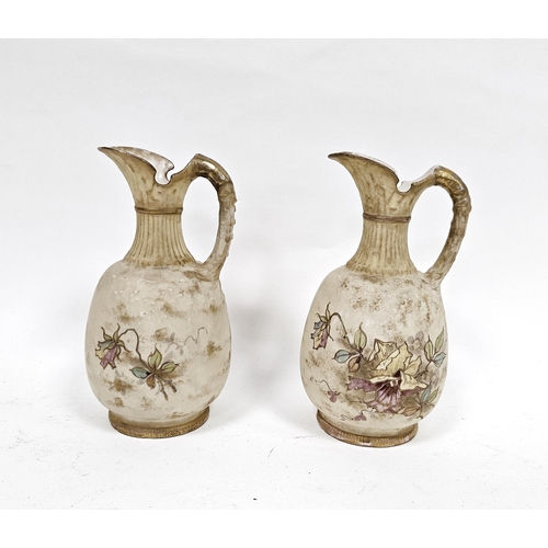 65A - Pair of Art Nouveau Austrian blush ivory ceramic jugs, marked R St K, 16cm high