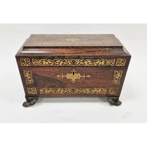1003 - Early 19th century rosewood and brass inlaid tea caddy of sarcophagus form, the hinged lid opening t... 