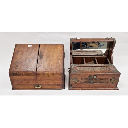 1011 - Edwardian oak tantalus, brass-mounted with hinged foliate carved front flaps opening to reveal compa... 