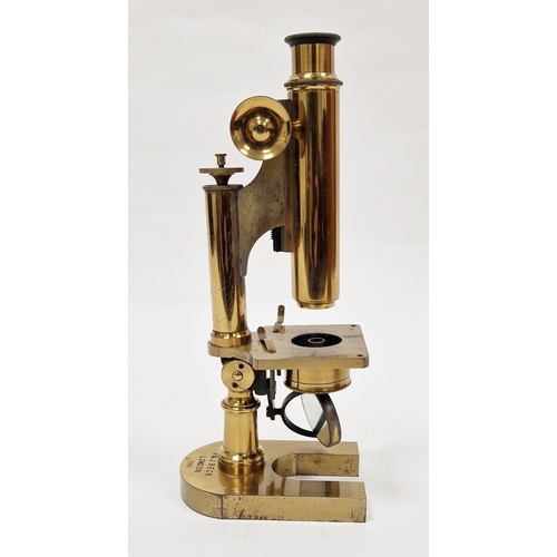 122 - Early 20th century gilt brass microscope by R & J Beck of London, model no. 7999, with spare lenses,... 