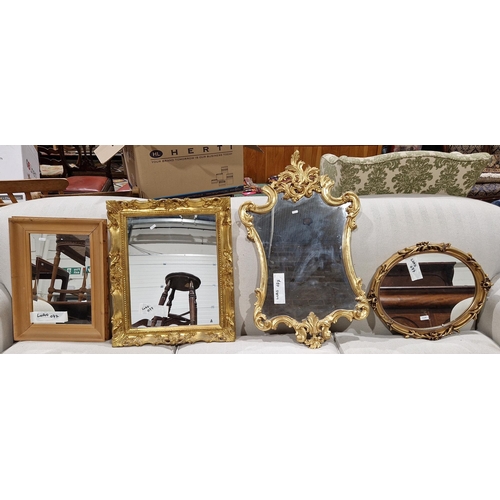 1336 - Three modern gilt wall mirrors in the antique style and a pine framed rectangular mirror, largest 89... 