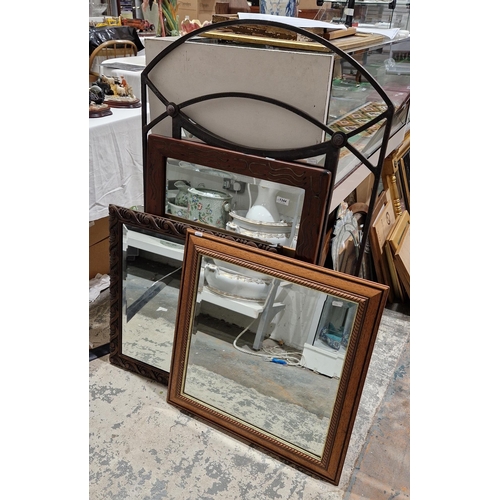 1344 - Collection of four mirrors including an iron-framed mirror with bevelled edge, 118cm high x 72cm wid... 